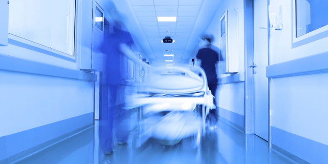 Bed in a modern clinic corridor