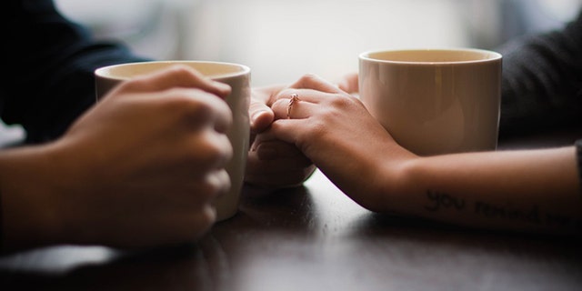 The lovebirds celebrated their photo shoot with a cup of joe.