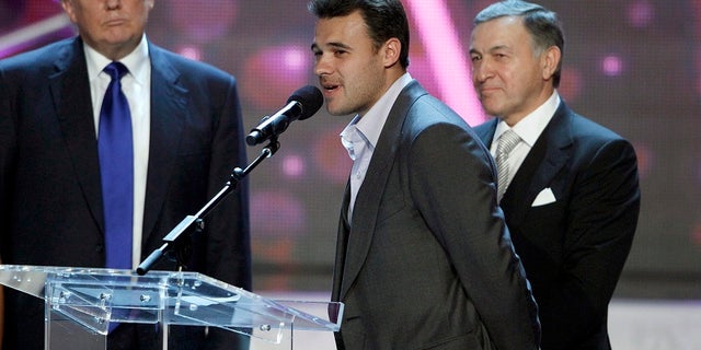 Russian singer Emin Agalarov (C) speaks as his father Aras Agalarov and Donald Trump (L), co-owner of the Miss Universe Organization, look on during a news conference after the 2013 Miss USA pageant at the Planet Hollywood Resort and Casino in Las Vegas, Nevada June 16, 2013. Trump announced that the 2013 Miss Universe pageant will be held November 9 at the Crocus City Hall in Moscow. REUTERS/Steve Marcus (UNITED STATES - Tags: ENTERTAINMENT BUSINESS) FOR EDITORIAL USE ONLY. NOT FOR SALE FOR MARKETING OR ADVERTISING CAMPAIGNS - RTX10QHN