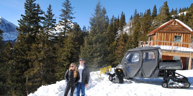 Jan. 24, 2014: Andy and Ceil Barrie stand for a photo next to their mining cabin near Breckenridge, Colo.