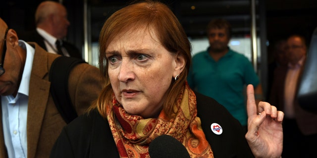 Emma Dent Coad, Labour MP for Kensington speaks to the media after the first hearing in the public inquiry into the Grenfell Tower disaster, in central London, Britain, September 14, 2017. REUTERS/Mary Turner - RC118D4091C0