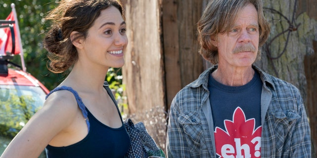 Emmy Rossum (left) as Fiona Gallagher and William H. Macy as Frank Gallagher in Showtime's "Shameless."