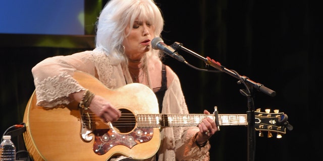 Emmylou Harris praised fellow singer Vince Gill for singing his song "Forever Changed."
