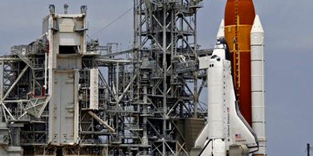 In this April 29, 2011 file photo, space shuttle Endeavour is seen on Pad 39A moments after launch was scrubbed because of technical problems at the Kennedy Space Center in Cape Canaveral, Fla. NASA will try again next Monday, May 16. 2011 to launch Endeavour on the next-to-last space shuttle flight, after replacing a switch box and plugging in new electrical wiring. (AP/File)