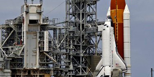 In this April 29, 2011 file photo, space shuttle Endeavour is seen on Pad 39A moments after launch was scrubbed because of technical problems at the Kennedy Space Center in Cape Canaveral, Fla. NASA will try again next Monday, May 16. 2011 to launch Endeavour on the next-to-last space shuttle flight, after replacing a switch box and plugging in new electrical wiring. (AP/File)