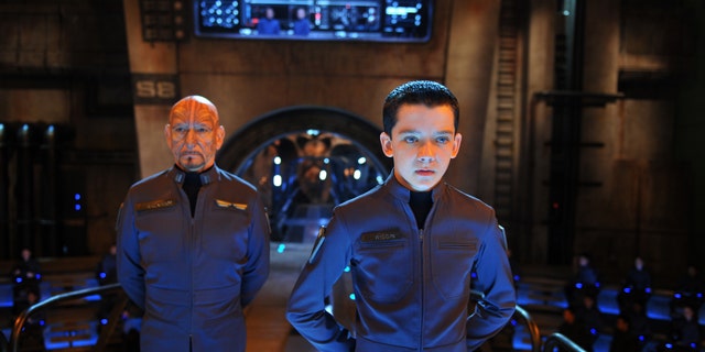 This image released by Summit Entertainment shows Ben Kingsley, left, and Asa Butterfield in a scene from "Ender's Game."