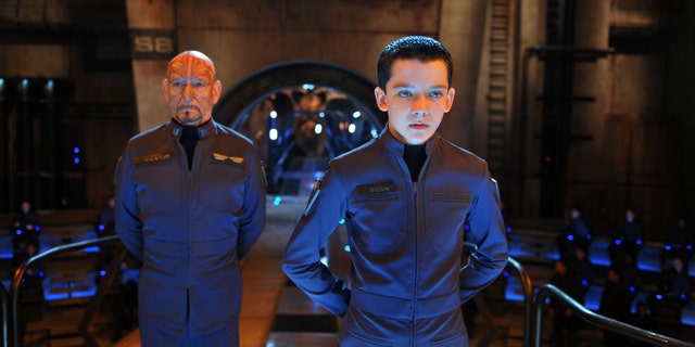 This image released by Summit Entertainment shows Ben Kingsley, left, and Asa Butterfield in a scene from "Ender's Game."