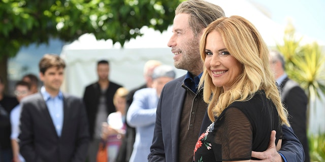 Actors John Travolta and Kelly Preston pose for photographers during a photo call for the film 'Gotti' at the 71st international film festival, Cannes, southern France.