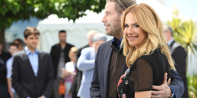 Actors John Travolta and Kelly Preston pose for photographers during a photo call for the film 'Gotti' at the 71st International Film Festival, Cannes, Southern France.