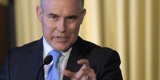 FILE - In this Feb. 21, 2017 file photo, Environmental Protection Agency (EPA) Administrator Scott Pruitt speaks in Washington. While Oklahomas attorney general, emails show that new Environmental Protection Agency chief Scott Pruitt was in frequent contact with fossil fuel companies and special interest groups working to undermine federal efforts to curb planet-warming carbon emissions. (AP Photo/Susan Walsh, File)