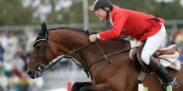 July 29, 2007: Canada's Ian Millar rides "In Style" during the final jumping competition at the Pan American Games in Rio de Janeiro.
