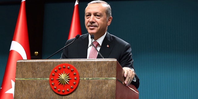 Erdogan is shown speaking after an emergency meeting of the government in Ankara last month.