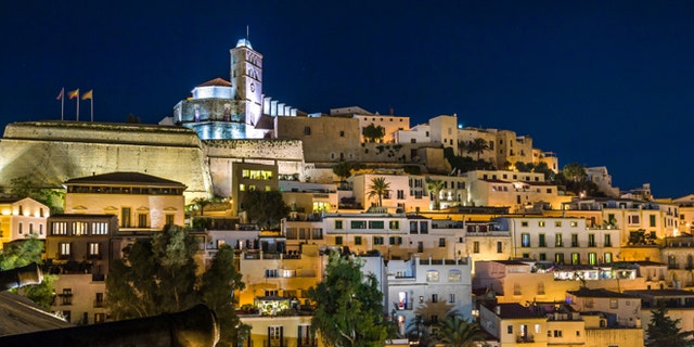 Old town Ibiza on the hill. Houses, fortress and cathedral night scene. Eivissa island, Spain.