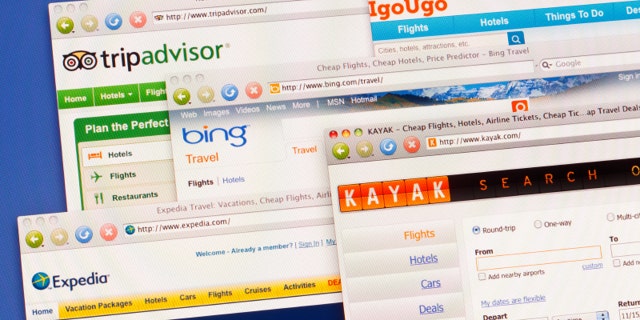Travel web sites on computer screen including Expedia, Tripadvisor, Bing Travel, Kayak, Triporama and igougo.Shot on a color LCD monitor