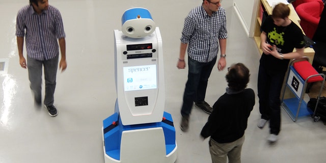 Spencer the robot helps airline passengers navigate through busy terminals.