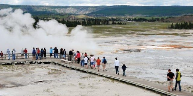 Boardwalks in Yellowstone are designed to protect tourists from slipping into natural geothermal features.