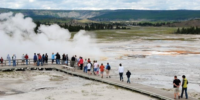 Boardwalks in Yellowstone are designed to protect tourists from slipping into natural geothermal features.