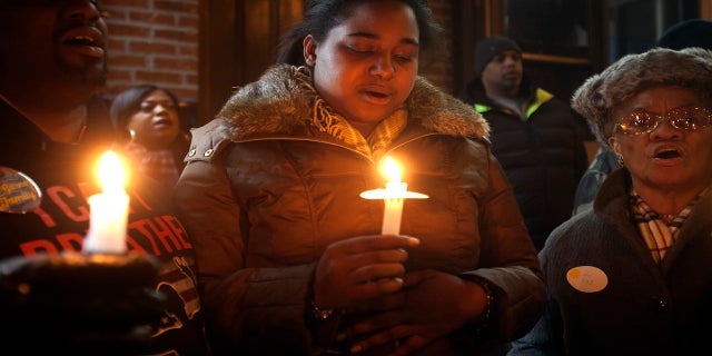 Erica Garner, pictured here in January 2015, has been in a medically induced coma since Saturday, after suffering a heart attack.