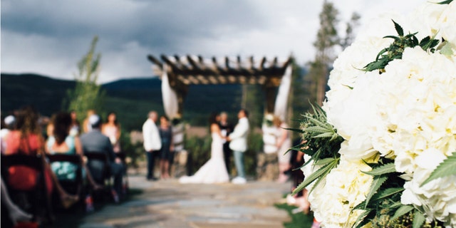 Creative couples can incorporate the cannabis plant into wedding day floral decor.