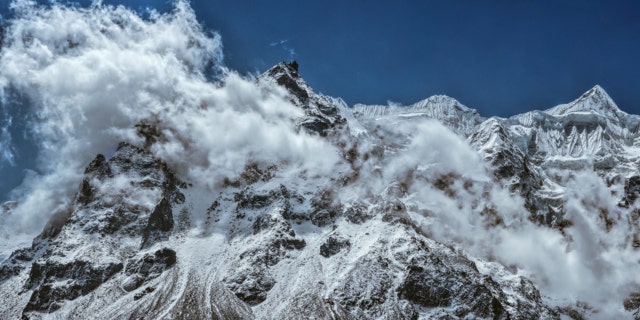 Scenic panorama of majestic mountain wall of Kanchenjunga in Himalayas, Nepal