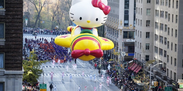 The "Hello Kitty" balloon float makes its way down the Avenue of the Americas during the 89th Macy's Thanksgiving Day Parade in New York City, November 26, 2015.