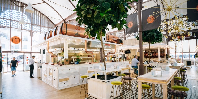 Seville, Spain - June 24, 2015: Food market and a Spanish restaurant Mercado Gourmet Lonja Del Barranco