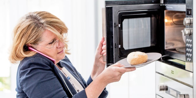 Businesswoman in the morning getting her Breakfast ready