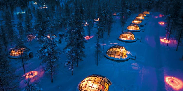C1GY7Y Kakslauttanen Hotel - Finland When you tire of the endless sandy beaches and azure waters of warm climates, but you are not