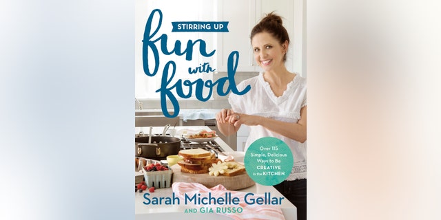 This cover image released by Grand Central Life & Style shows "Stirring Up Fun with Food: Over 115 Simple, Delicious Ways to Be Creative in the Kitchen," by Sarah Michelle Gellar and Gia Russo.