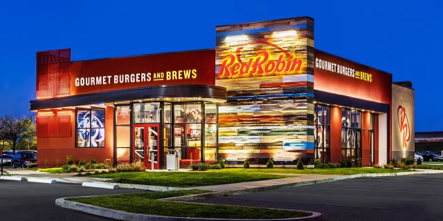 Red Robin CEO Denny Marie Post got inked after employees improved their service grades.