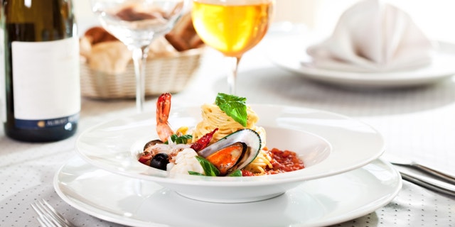 Seafood Spaghetti with Tiger Prawns, Scallops, Mussels, Calamari, Salmon and Tomato Sauce