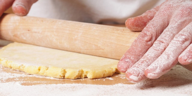 Roll out pastry to round. Making Apple Pie Tart Series.