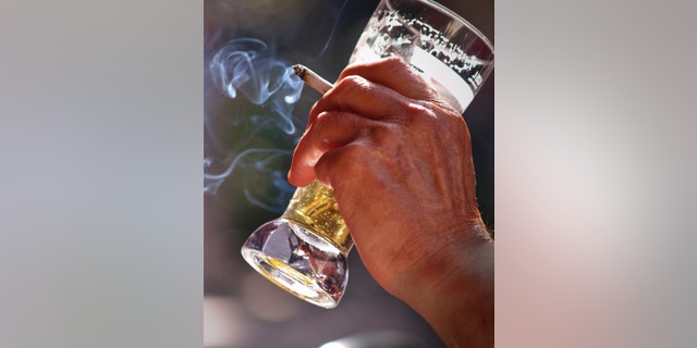 Drinking beer and smoking cigarettes