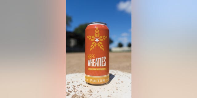 The can of HefeWheaties was inspired by the signature orange cereal box.