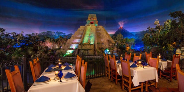 A tourist climbed the Mesoamerican pyramid at Epcot's Mexico Pavilion in Orlando.