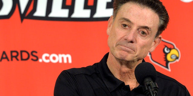 Oct. 3: Louisville head coach Rick Pitino responds to a question following an NCAA college basketball team's intrasquad scrimmage in Louisville.
