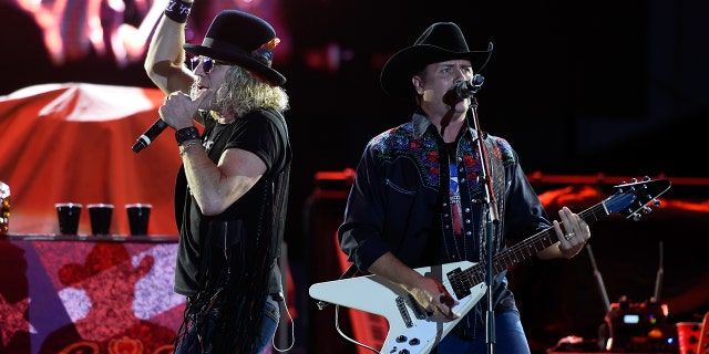 Big Kenny (L) and John Rich of Big & Rich perform during the Route 91 Harvest country music festival at the Las Vegas Village on October 1, 2017 in Las Vegas, Nevada.