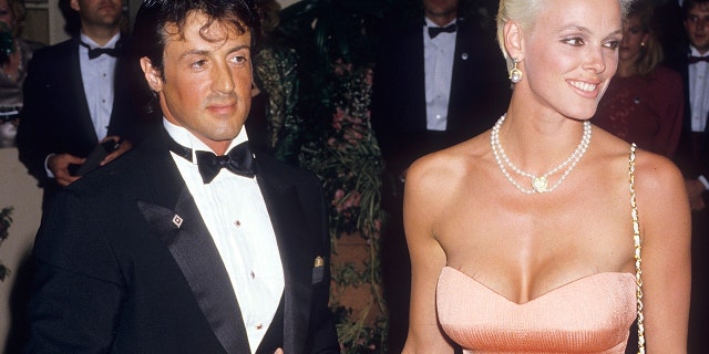 Sylvester Stallone and Brigitte Nielsen attend the 15th Annual American Film Institute (AFI) Lifetime Achievement Award Salute to Barbara Stanwyck on April 9, 1987 at the Beverly Hilton Hotel in Beverly Hills, California.