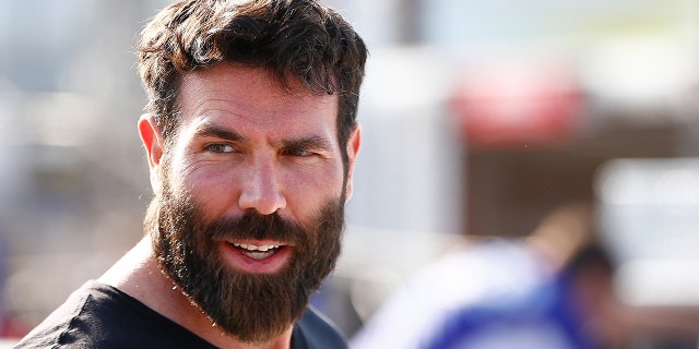 Poker player Dan Bilzerian attends qualifying for the NASCAR Sprint Cup Series Toyota Owners 400 at Richmond International Raceway on April 24, 2015 in Richmond, Virginia.
