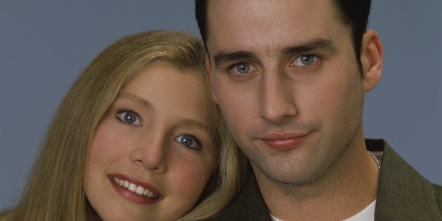 Original "Roseanne" cast members Sarah Chalke (left) and Glenn Quinn in a 1993 photo.