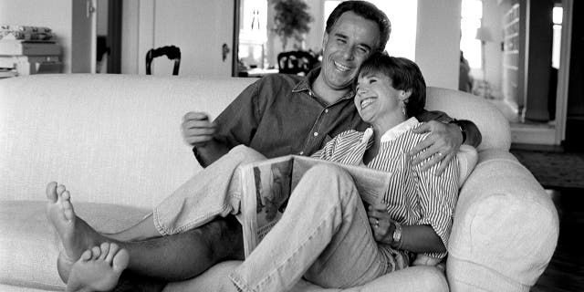 NBC's the "Today" show co-host Katie Couric at home with her husband, MSNBC legal analyst Jay Monahan. (Photo by Deborah Feingold/Corbis via Getty Images)