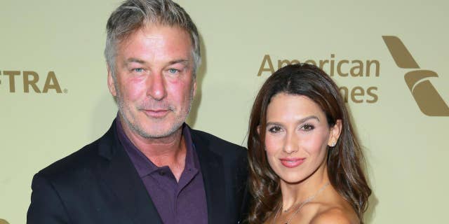 Alec Baldwin, left, and wife Hilaria welcome son Romeo on May 17.