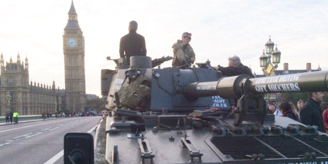 Cruise past Big Ben in decommissioned military tank.