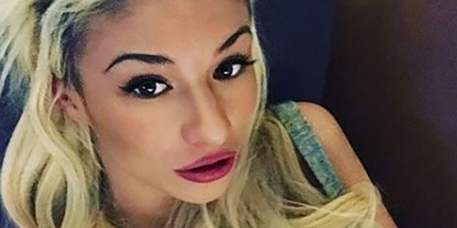 Irina Aizina's body was discovered in a field.