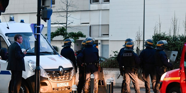 French riot police officers patrol in Nantes.