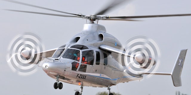 The Eurocopter's X3 high-speed hybrid helicopter demonstrator is seen at the Istres flight testing center, September 27, 2010. The X3 protoype, which combines forward-facing propeller engines astride two short aircraft wings with overhead rotor blades, was unveiled at the European company's factory in southern France following months of secrecy about the project.