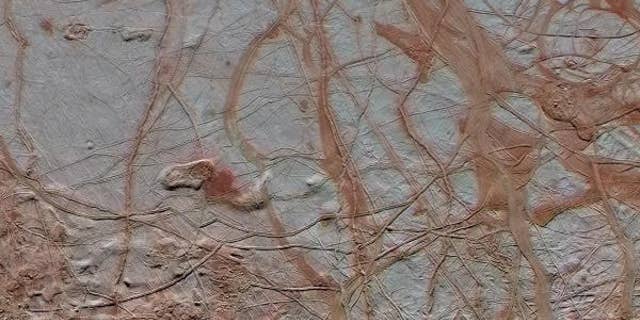 This enhanced-color view shows a swath of Jupiter’s moon Europa that's 217 miles wide by 466 miles long (350 by 750 kilometers). New research suggests that Europa's surface could be 95 percent porous, meaning a probe might sink if it landed there.