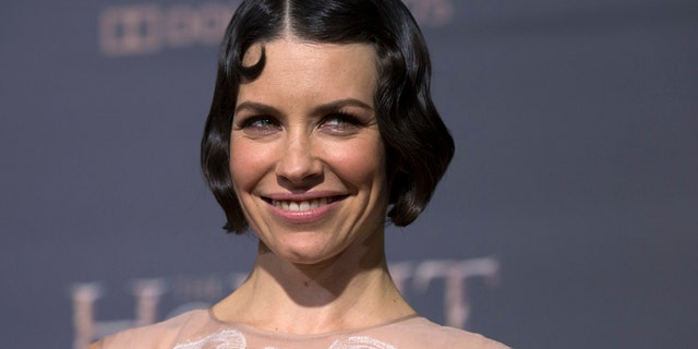 Cast member Evangeline Lilly poses at the premiere of "The Hobbit: The Battle of the Five Armies" at Dolby theatre in Hollywood, California December 9, 2014.