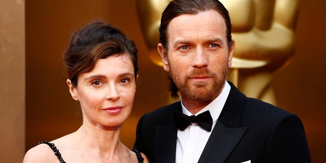 Actor Ewan McGregor and his wife Eve Mavrakis arrive at the 86th Academy Awards in Hollywood, California March 2, 2014.