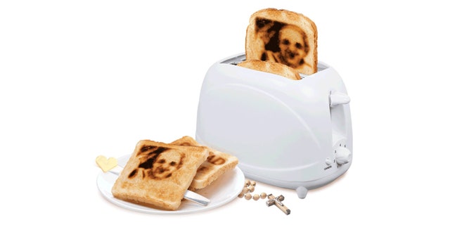 This toaster comes with interchangeable plates to create a likeness of His Holiness on bread.